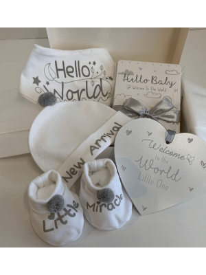 Small White Baby Hamper with hat, booties, bib, milestone cards and welcome to the world wooden hanging plaque, all gift boxed