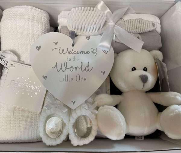 white baby gift hamper containing 12 practical newborn products, comes gift boxed