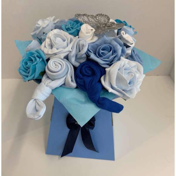 Blue Baby Clothing Bouquet, a selection of baby clothes made to look like a bunch of flowers in a vase