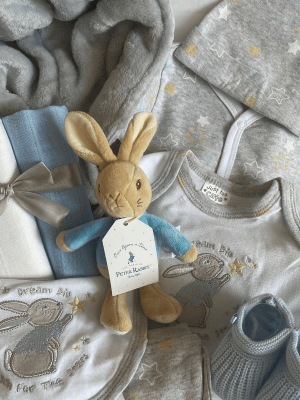 Peter Rabbit Gift Set that contains a gift box of baby clothing and a Peter rabbit toy