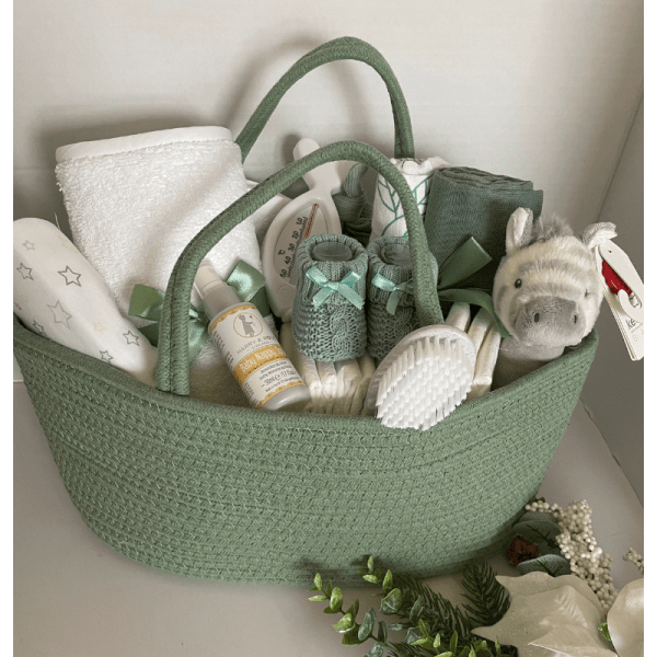 Sage Filled Nappy Caddy, all your practical baby products and lotions inside a woven nappy caddy basket