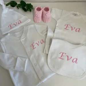 Personalised Baby Layette Set that includes a 5pce clothing set that can be personalised with baby name on each piece